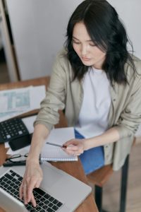 "Woman at desk preparing CTPD and transfer pricing documentation applying arm’s length principle"